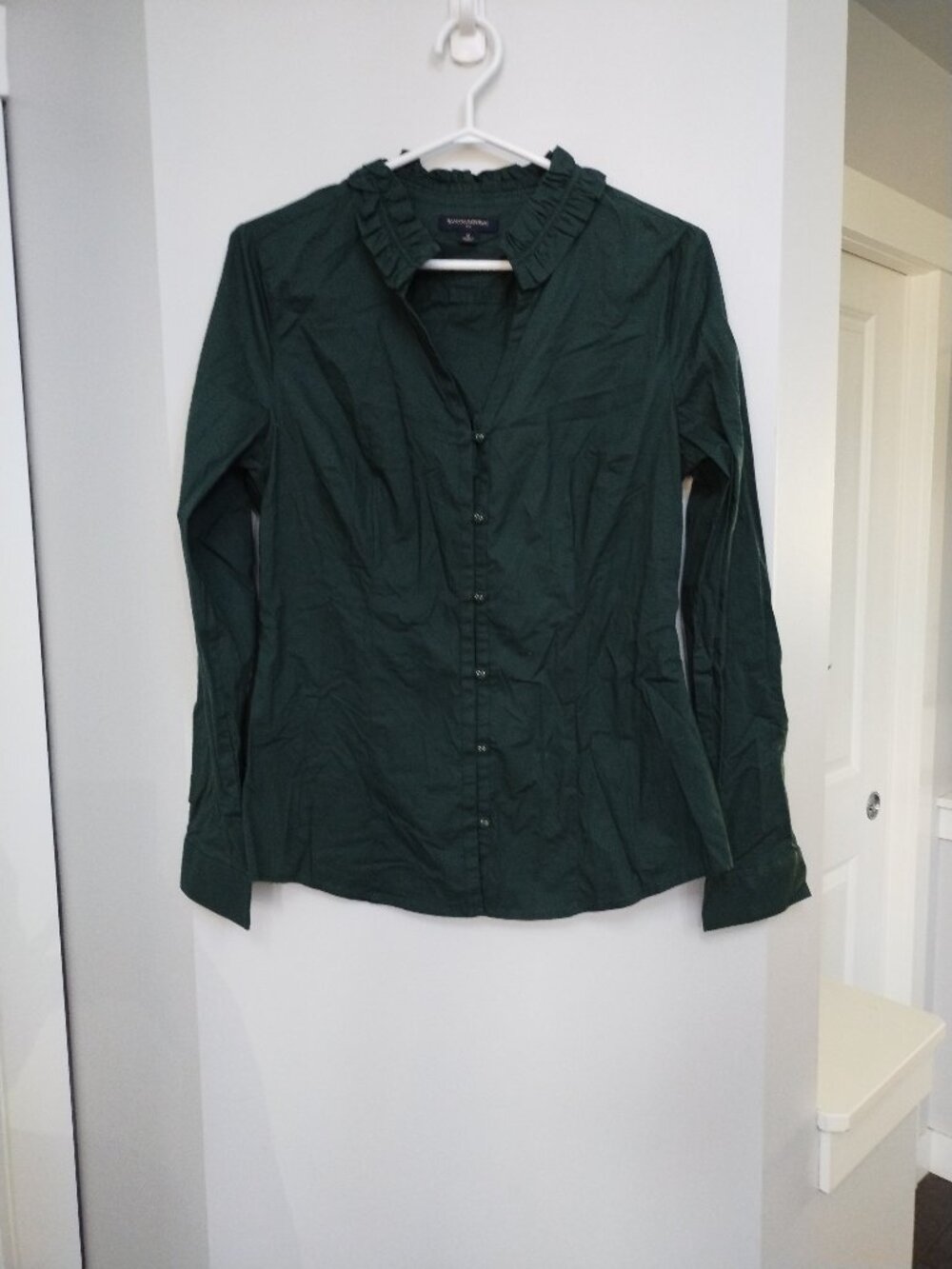 Emerald Green Banana Republic blouse with ruffle neckline